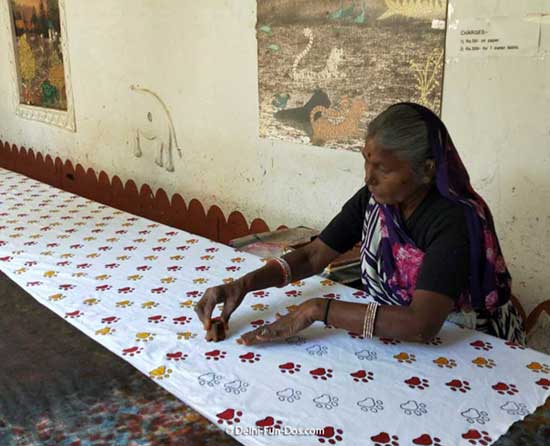 woman block printing cotton fabric
